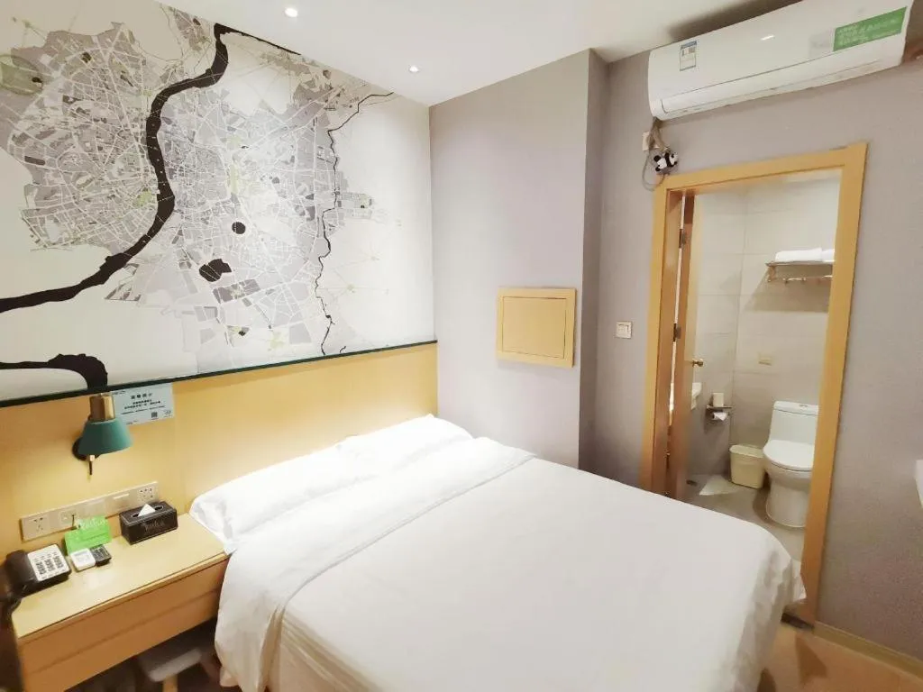 Bed in Vatica Hotel Hefei Yaohai Longgang Subway Station