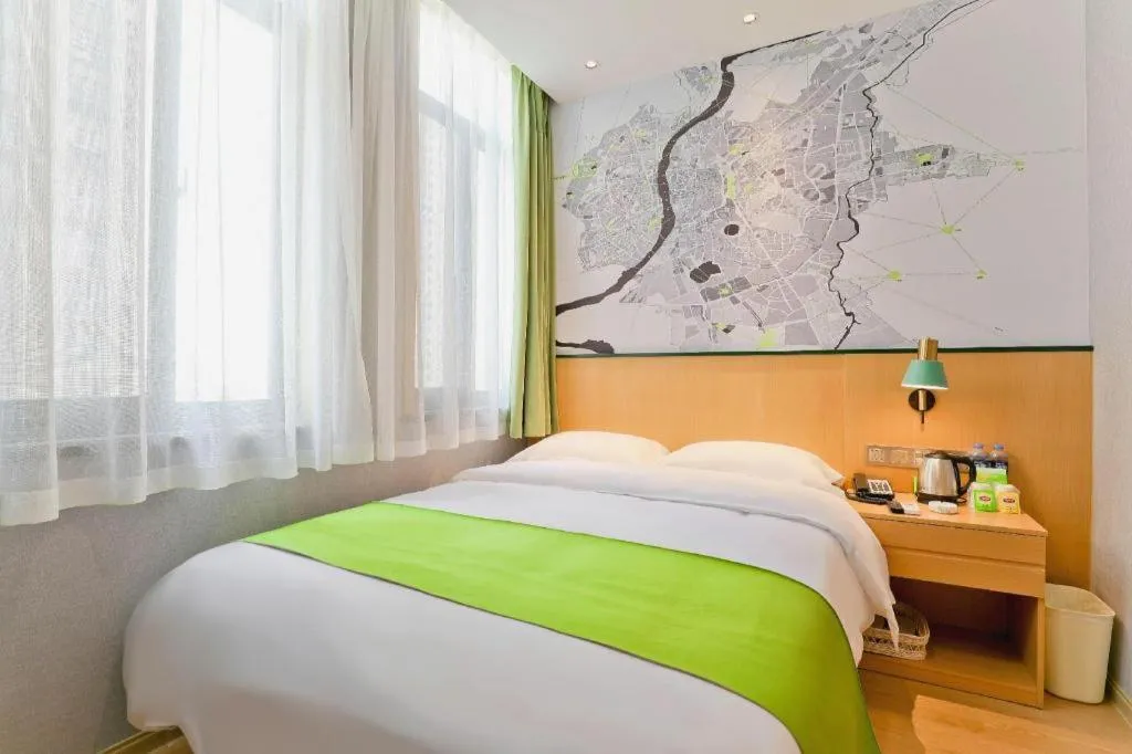 Bed in Vatica Hotel Hefei Yaohai Longgang Subway Station