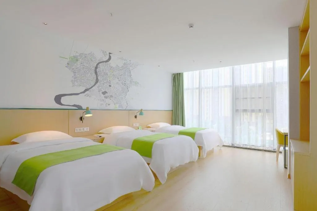 Bed in Vatica Hotel Hefei Yaohai Longgang Subway Station