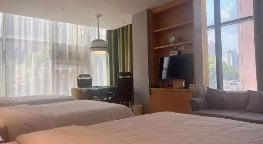 Bed in Vatica Hotel Hefei Yaohai Longgang Subway Station
