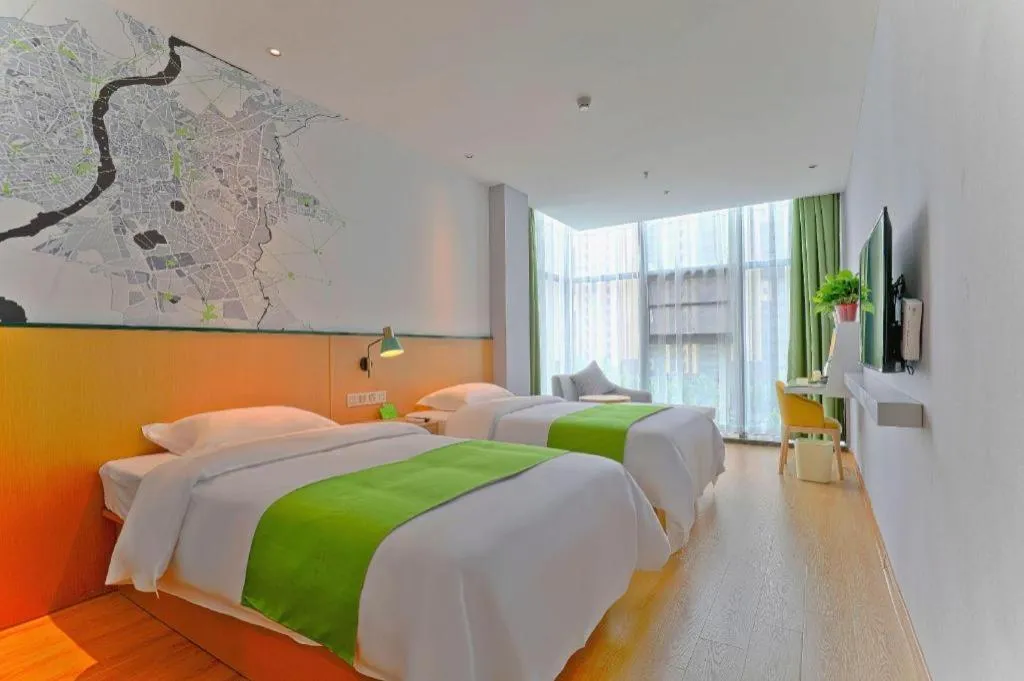 Bed in Vatica Hotel Hefei Yaohai Longgang Subway Station