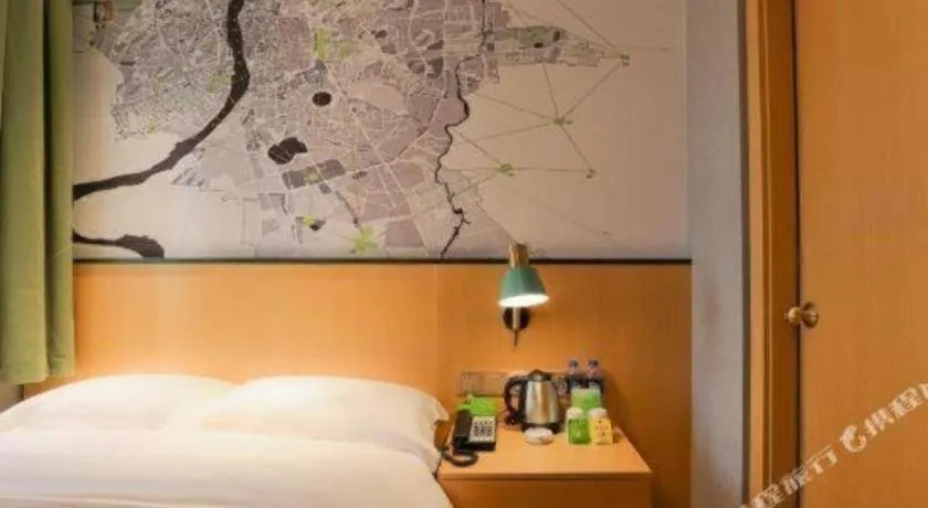 Bed in Vatica Hotel Hefei Yaohai Longgang Subway Station