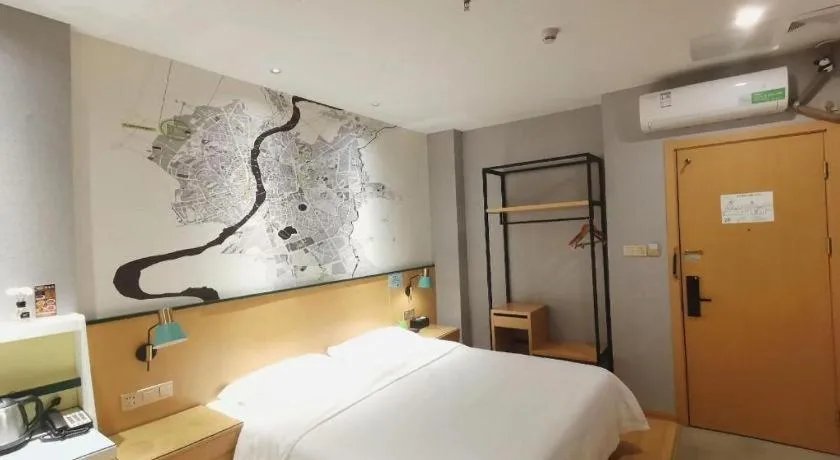 Bed in Vatica Hotel Hefei Yaohai Longgang Subway Station