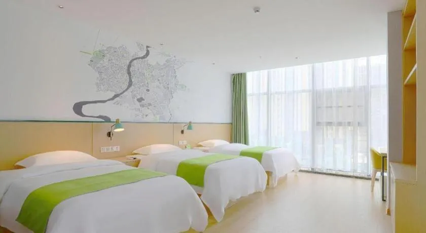 Bed in Vatica Hotel Hefei Yaohai Longgang Subway Station