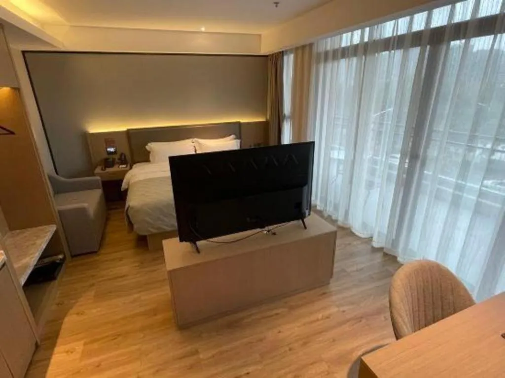 Bed in Gya Hotel Nantong Nanshang Lake Street Wanda Plaza