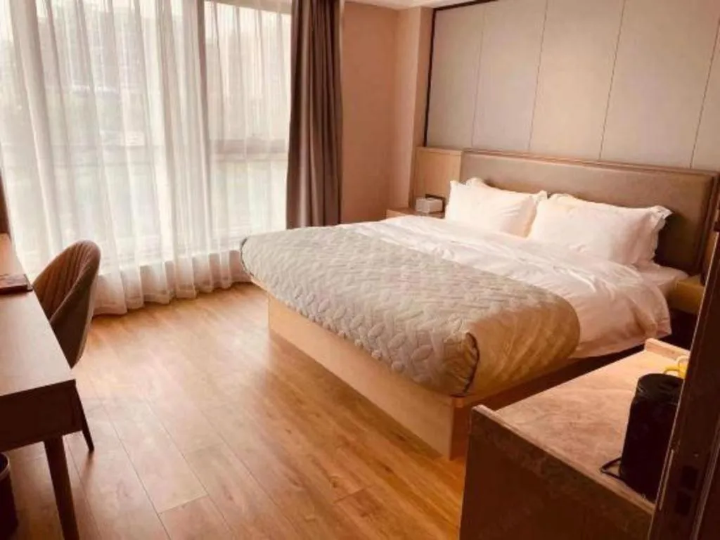 Bed in Gya Hotel Nantong Nanshang Lake Street Wanda Plaza