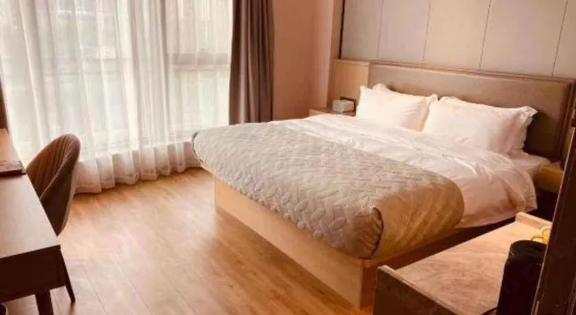 Bed in Gya Hotel Nantong Nanshang Lake Street Wanda Plaza