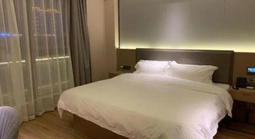 Bed in Gya Hotel Nantong Nanshang Lake Street Wanda Plaza