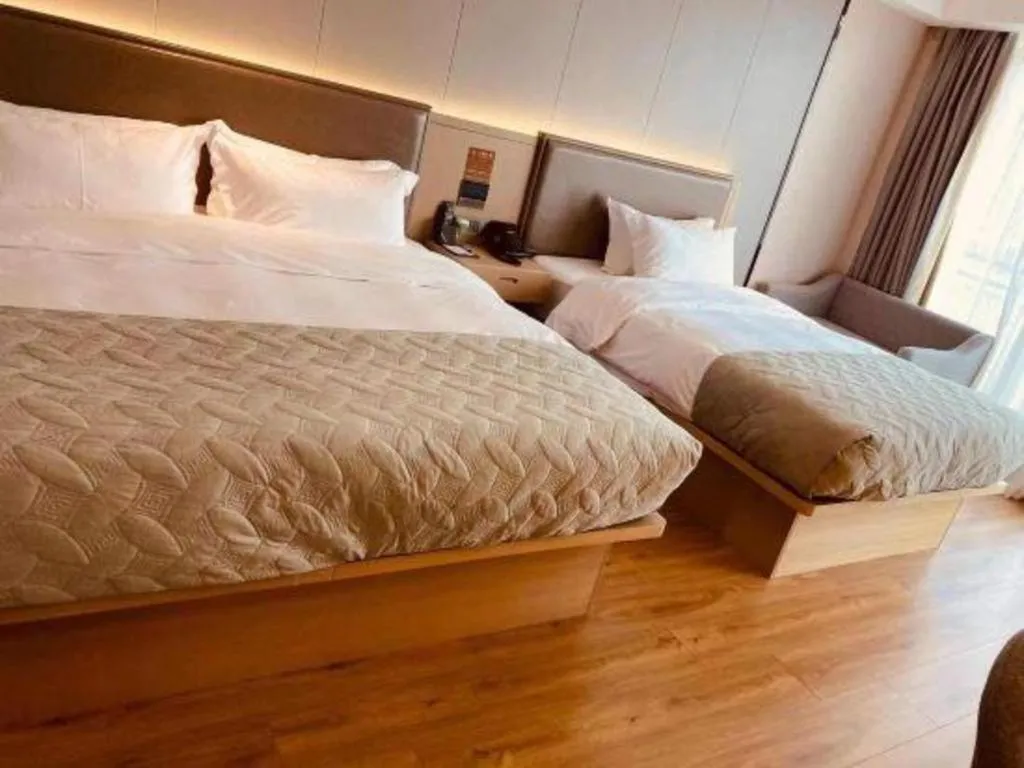 Bed in Gya Hotel Nantong Nanshang Lake Street Wanda Plaza