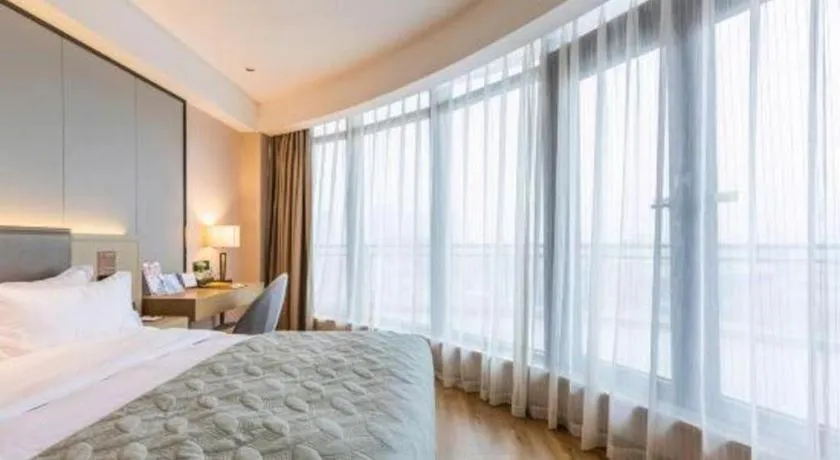 Bed in Gya Hotel Nantong Nanshang Lake Street Wanda Plaza