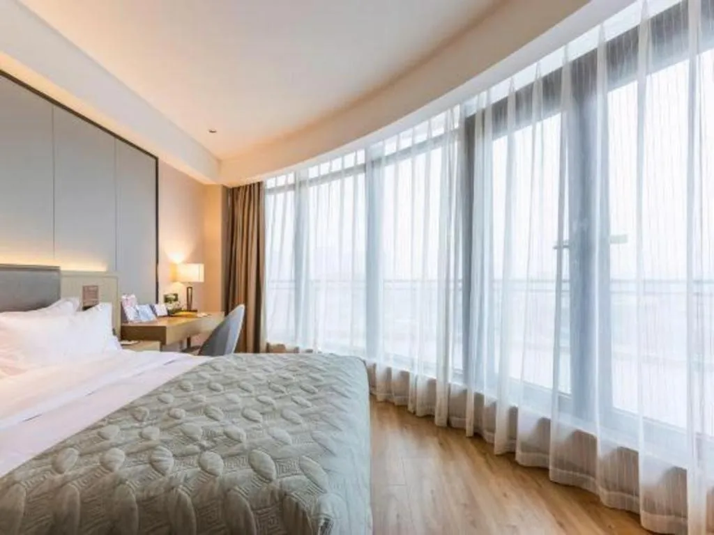 Bed in Gya Hotel Nantong Nanshang Lake Street Wanda Plaza