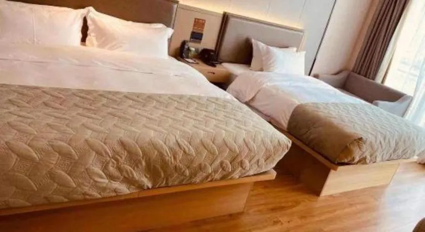 Bed in Gya Hotel Nantong Nanshang Lake Street Wanda Plaza