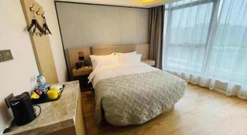 Bed in Gya Hotel Nantong Nanshang Lake Street Wanda Plaza