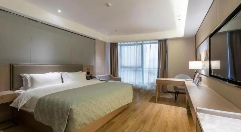 Bed in Gya Hotel Nantong Nanshang Lake Street Wanda Plaza