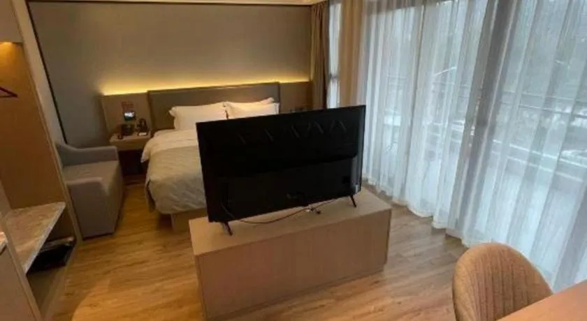 Bed in Gya Hotel Nantong Nanshang Lake Street Wanda Plaza