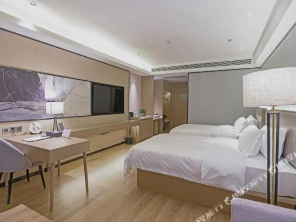 Bed in Gya Hotel Nantong Nanshang Lake Street Wanda Plaza