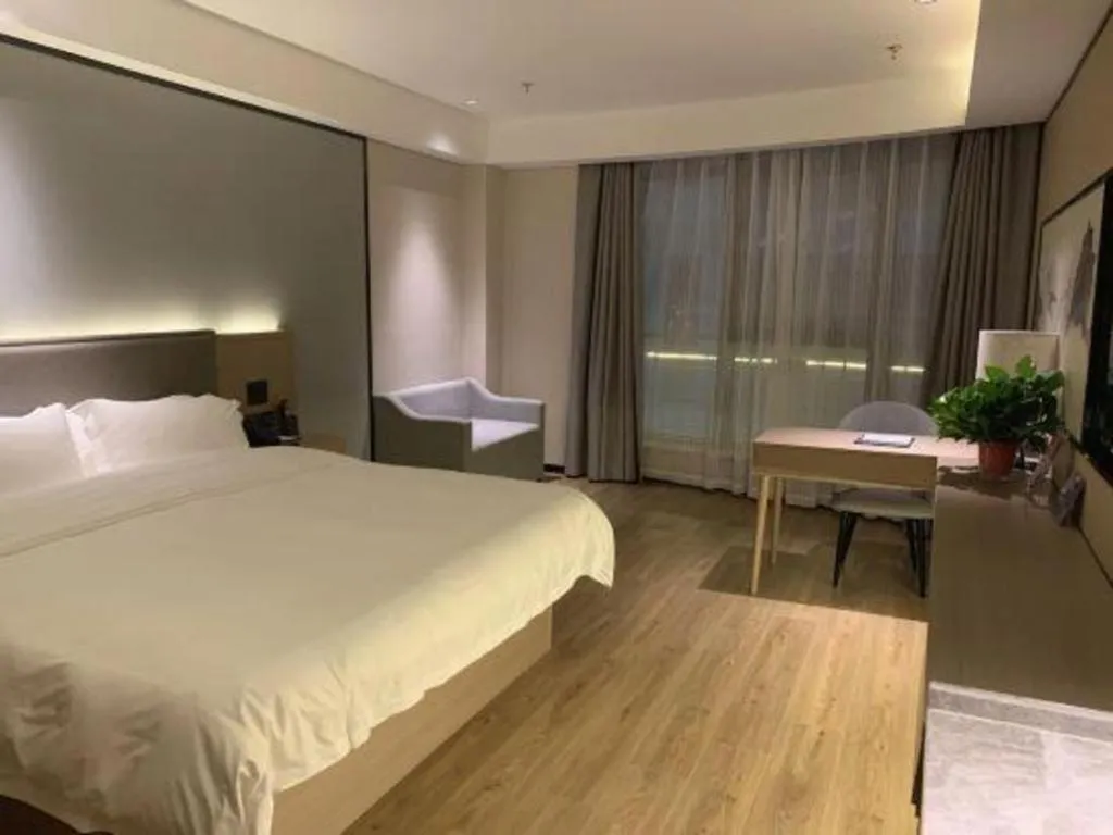 Bed in Gya Hotel Nantong Nanshang Lake Street Wanda Plaza