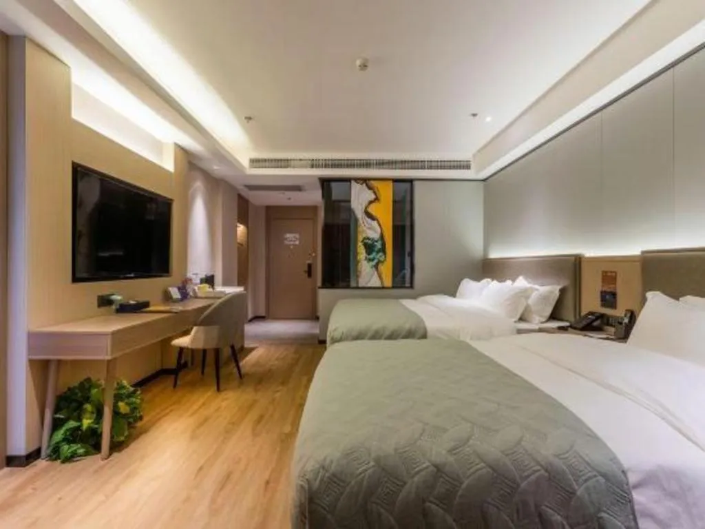 Bed in Gya Hotel Nantong Nanshang Lake Street Wanda Plaza