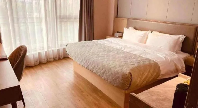 Bed in Gya Hotel Nantong Nanshang Lake Street Wanda Plaza