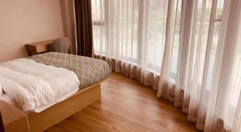 Bed in Gya Hotel Nantong Nanshang Lake Street Wanda Plaza