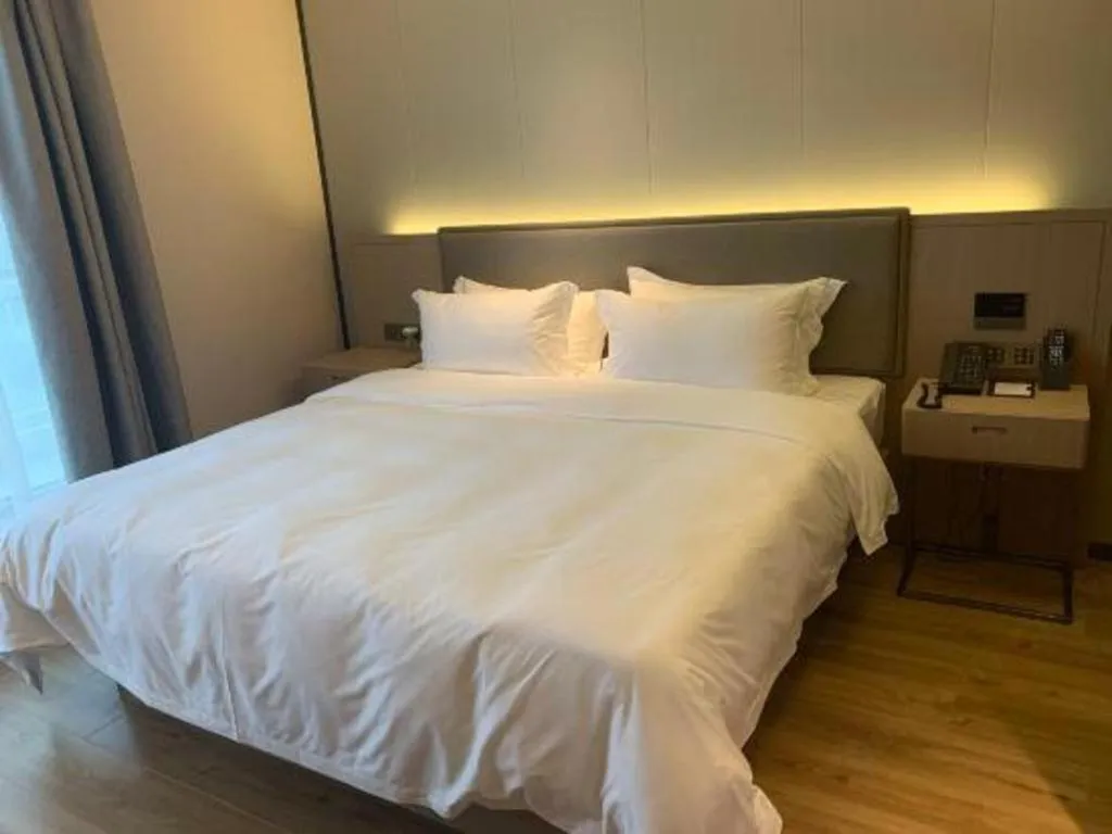 Bed in Gya Hotel Nantong Nanshang Lake Street Wanda Plaza