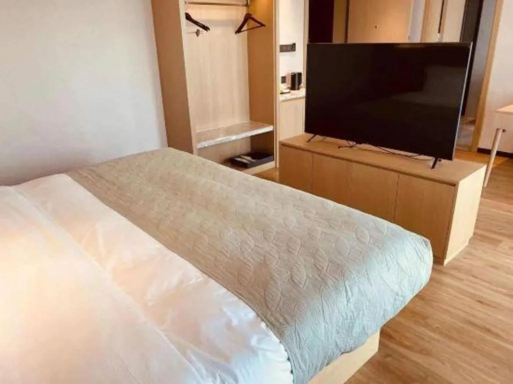 Bed in Gya Hotel Nantong Nanshang Lake Street Wanda Plaza