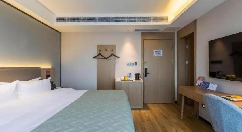 Bed in Gya Hotel Nantong Nanshang Lake Street Wanda Plaza