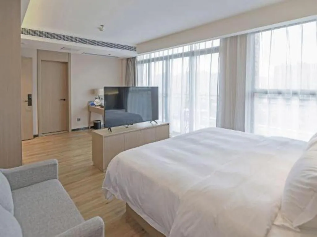 Bed in Gya Hotel Nantong Nanshang Lake Street Wanda Plaza