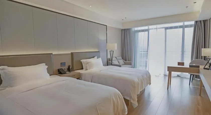 Bed in Gya Hotel Nantong Nanshang Lake Street Wanda Plaza