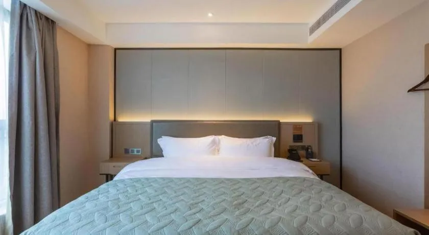 Bed in Gya Hotel Nantong Nanshang Lake Street Wanda Plaza