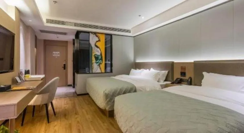 Bed in Gya Hotel Nantong Nanshang Lake Street Wanda Plaza