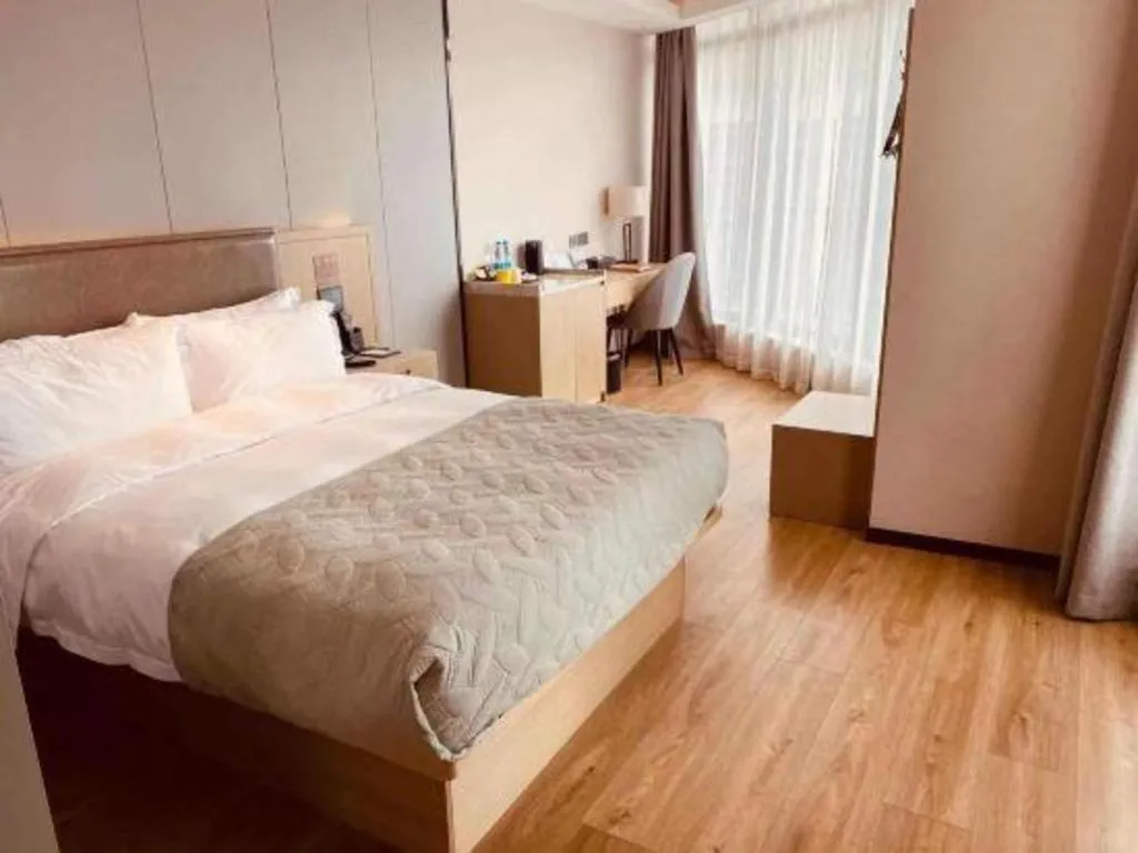 Bed in Gya Hotel Nantong Nanshang Lake Street Wanda Plaza