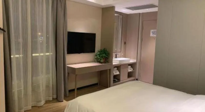 Bed in Gya Hotel Nantong Nanshang Lake Street Wanda Plaza