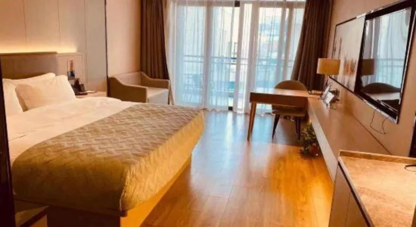 Bed in Gya Hotel Nantong Nanshang Lake Street Wanda Plaza