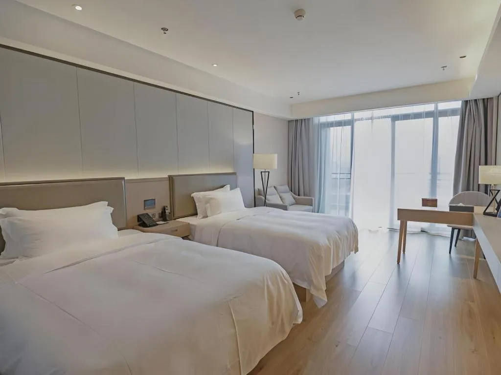 Bed in Gya Hotel Nantong Nanshang Lake Street Wanda Plaza