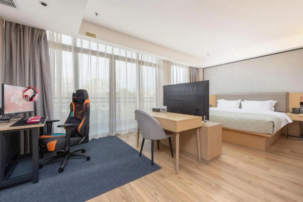 Bed in Gya Hotel Nantong Nanshang Lake Street Wanda Plaza