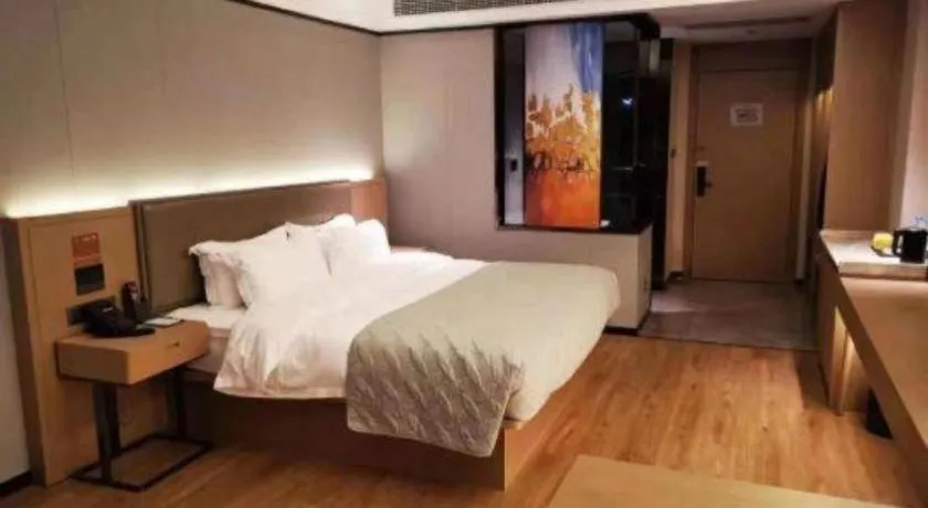 Bed in Gya Hotel Nantong Nanshang Lake Street Wanda Plaza