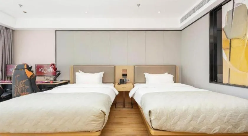 Bed in Gya Hotel Nantong Nanshang Lake Street Wanda Plaza