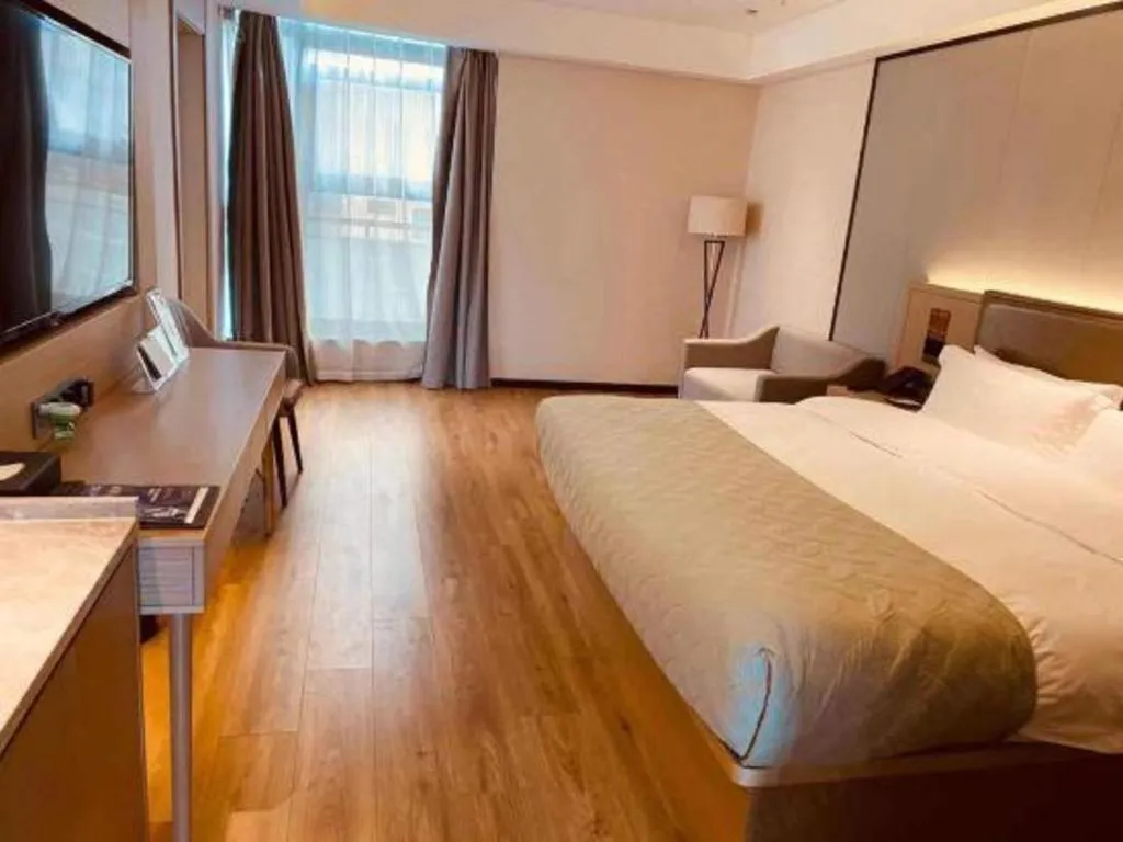 Bed in Gya Hotel Nantong Nanshang Lake Street Wanda Plaza