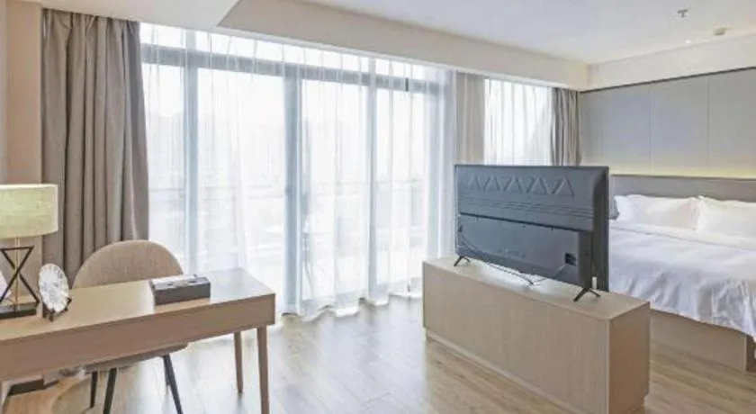 Bed in Gya Hotel Nantong Nanshang Lake Street Wanda Plaza