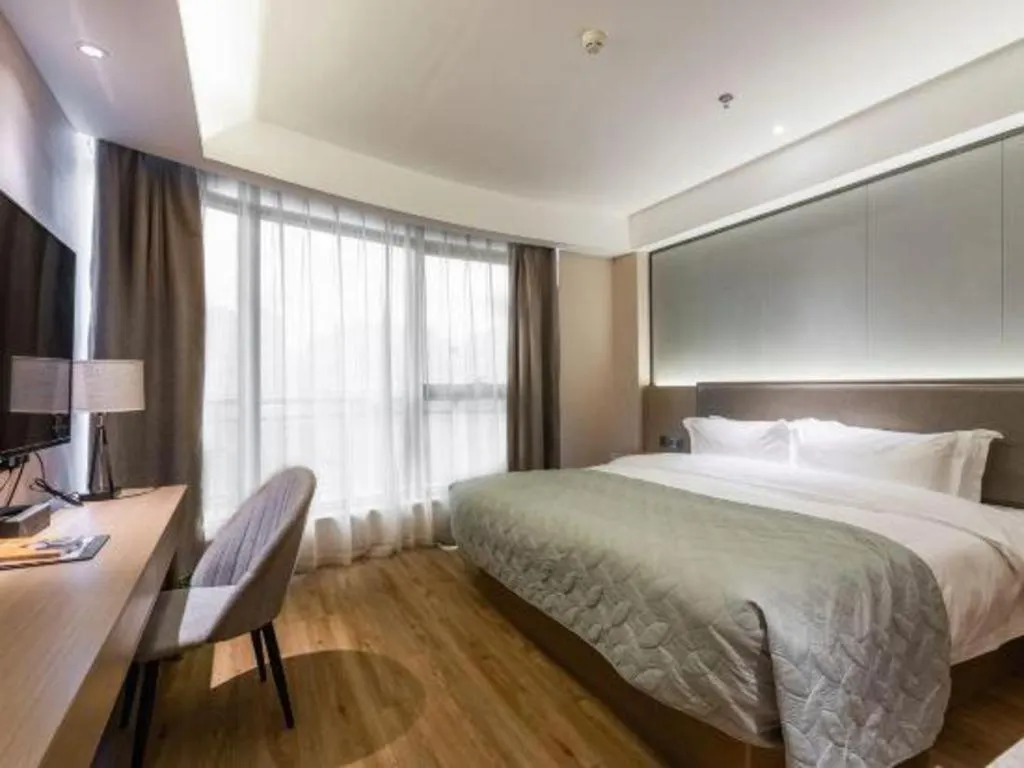 Bed in Gya Hotel Nantong Nanshang Lake Street Wanda Plaza