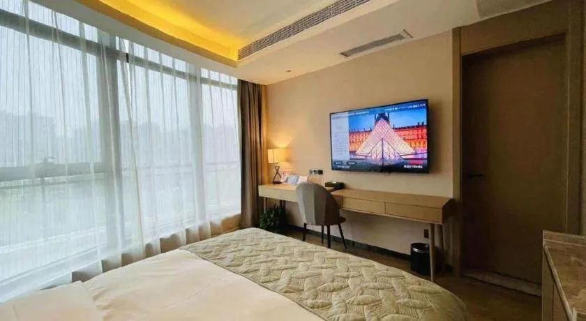 Bed in Gya Hotel Nantong Nanshang Lake Street Wanda Plaza