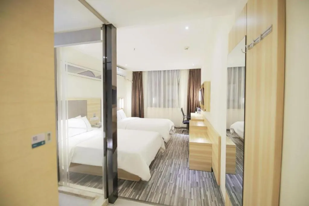 Bed in City Comfort Inn Changsha Window of the World Zhongmao City