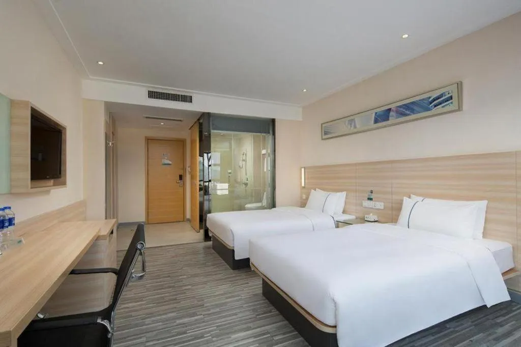 Bed in City Comfort Inn Changsha Window of the World Zhongmao City