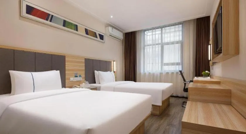 Bed in City Comfort Inn Changsha Window of the World Zhongmao City