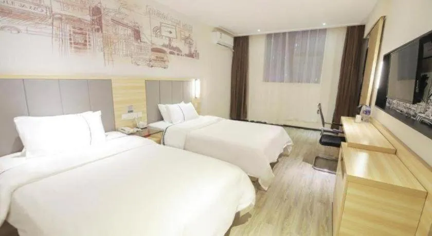 Bed in City Comfort Inn Changsha Window of the World Zhongmao City