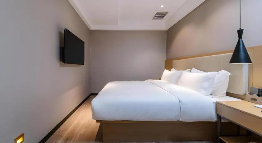 Bed in City Comfort Inn Guangzhou Shixi Metro Station Pazhou Exhibition