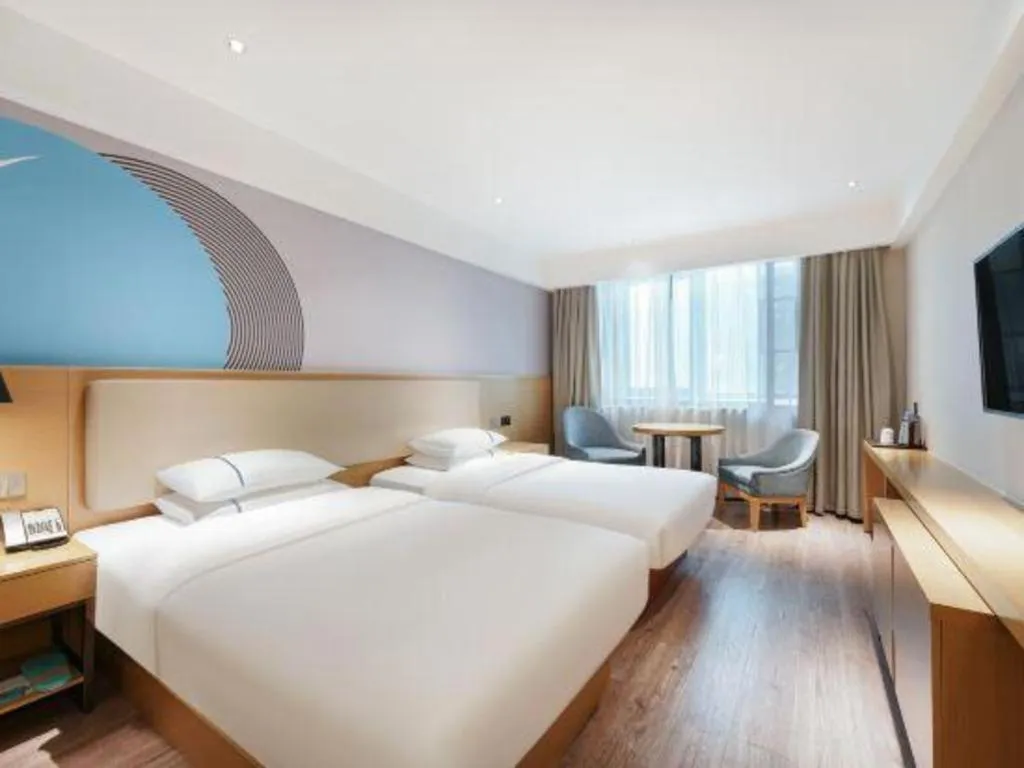 Bed in City Comfort Inn Guangzhou Shixi Metro Station Pazhou Exhibition