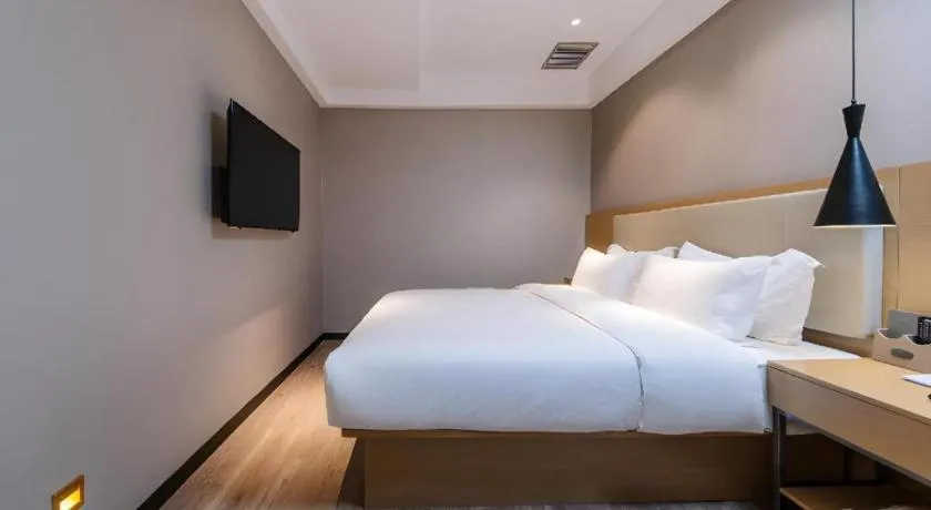 Bed in City Comfort Inn Guangzhou Shixi Metro Station Pazhou Exhibition