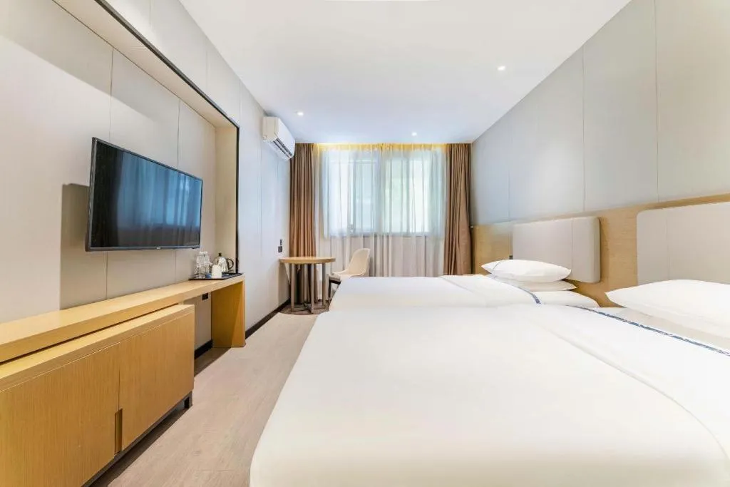 Bed in City Comfort Inn Guangzhou Shixi Metro Station Pazhou Exhibition